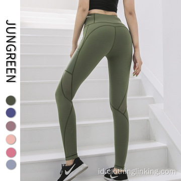 Legging yoga wanita dengan saku samping